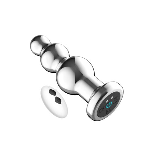 The SweetTemptation.nl PulseSphere Luxe Motion Massager, a metallic beaded device with a flared base and power button, is displayed next to its small oval aluminium draadloze afstandsbediening remote on a white background.